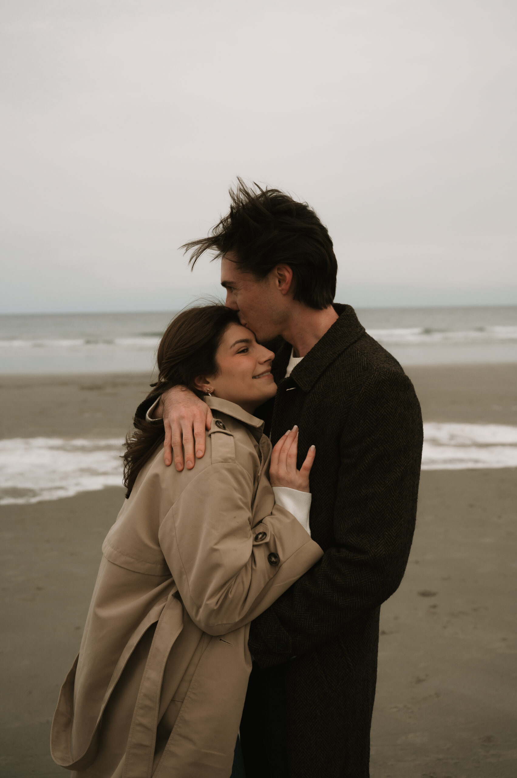 Intimate New England coastal engagement session photographed in a soft, editorial style