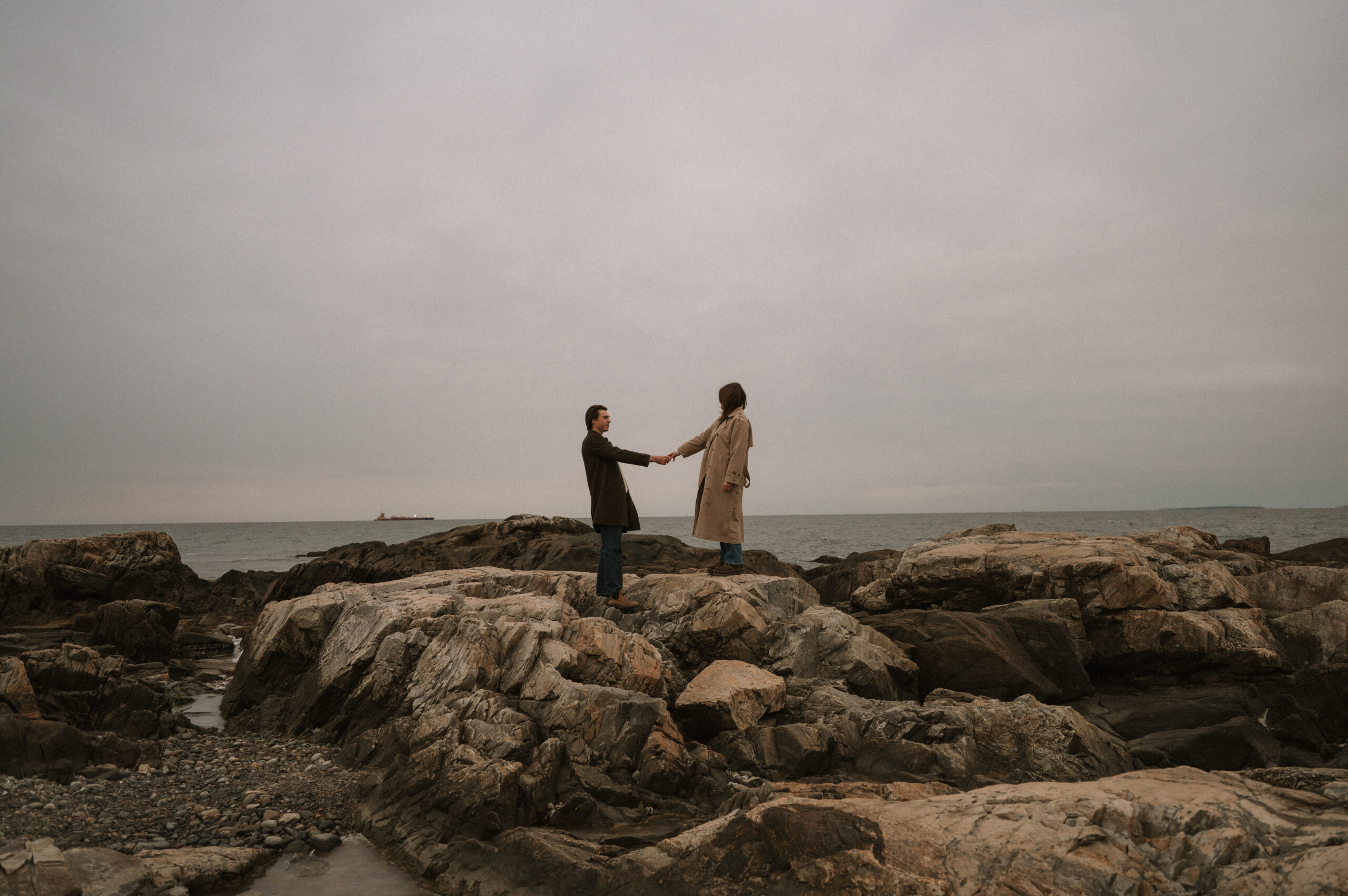 Cinematic engagement photography New England Film-inspired engagement photos New England Story-driven wedding photography New England Editorial coastal engagement photography Moody cinematic engagement session Timeless New England engagement photos Romantic cinematic wedding photography