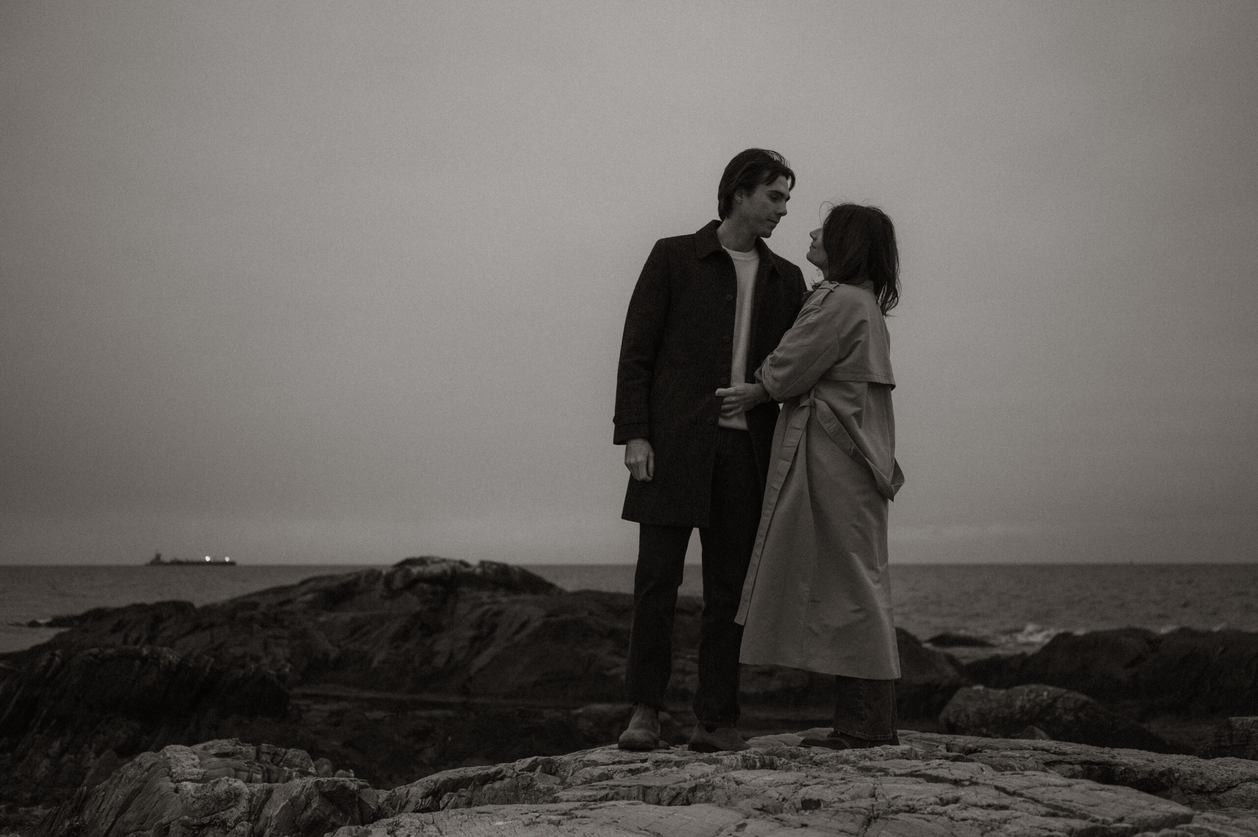 Cinematic engagement photography New England Film-inspired engagement photos New England Story-driven wedding photography New England Editorial coastal engagement photography Moody cinematic engagement session Timeless New England engagement photos Romantic cinematic wedding photography